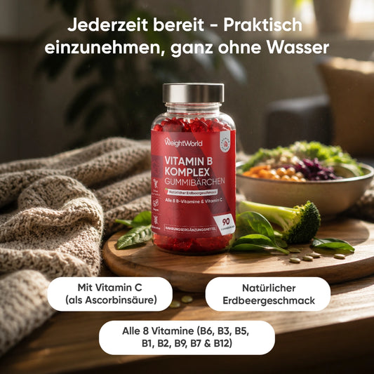 Vitamin-B-Komplex-Gummibärchen im Glasfläschchen mit rotem Inhalt
